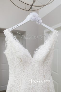 wedding dress with custom hanger Smirnova Photography